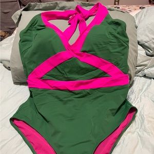 Green and pink one-piece swimsuit
